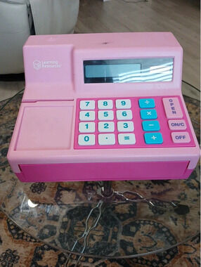 Pink play pretend calculator cash register